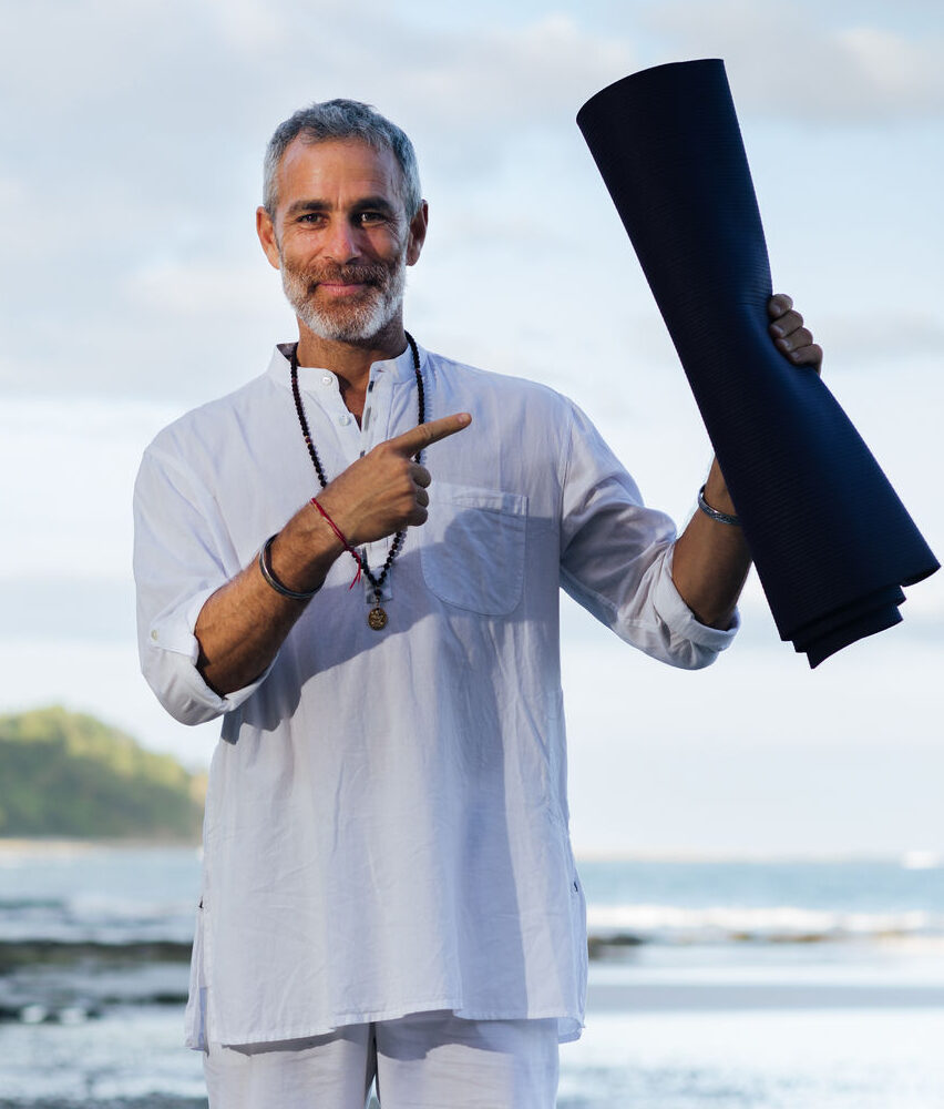 tommy rosen with yoga mat recovery from addiction